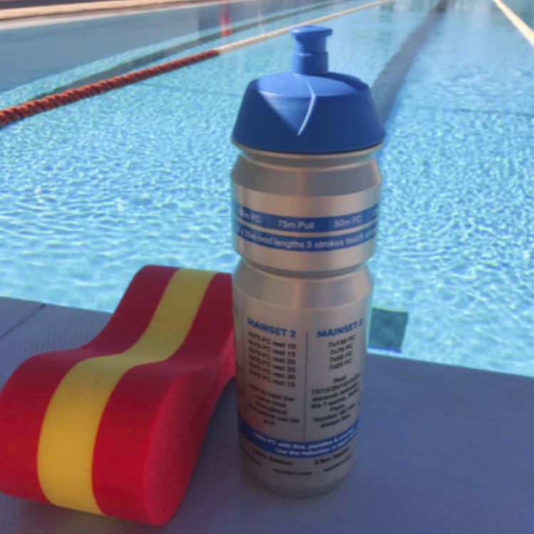 Training plan water bottle on pool side