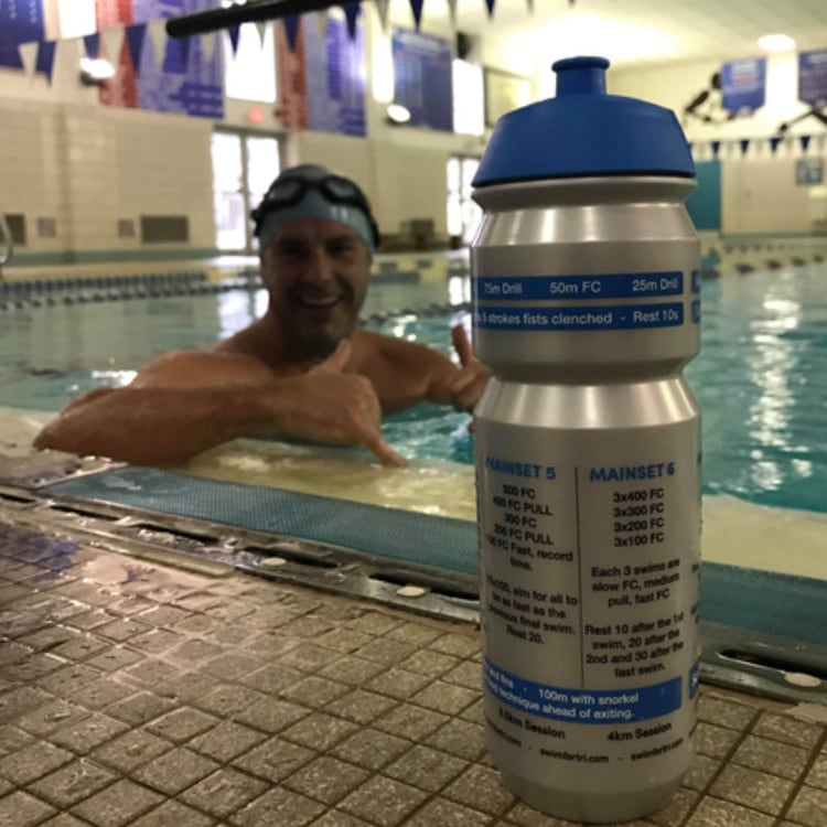 Training plan water bottle on pool side